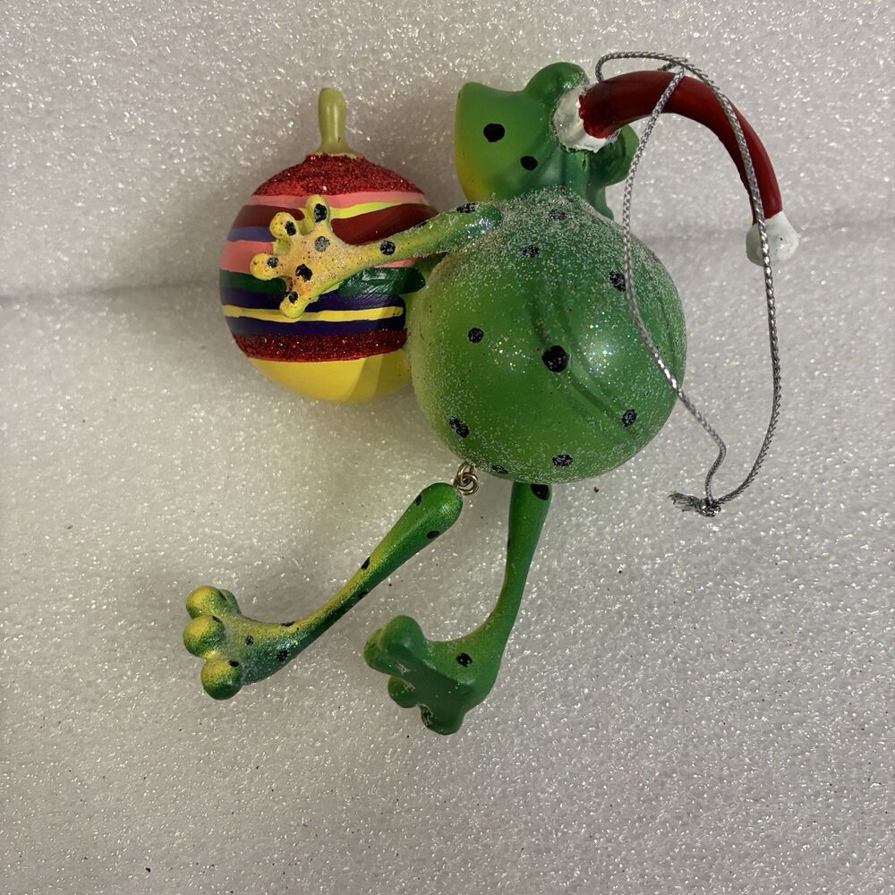 Frog Christmas Ornament Holding A Christmas Ball. Movable Legs. Hand Painted 5” - Picture 2 of 8